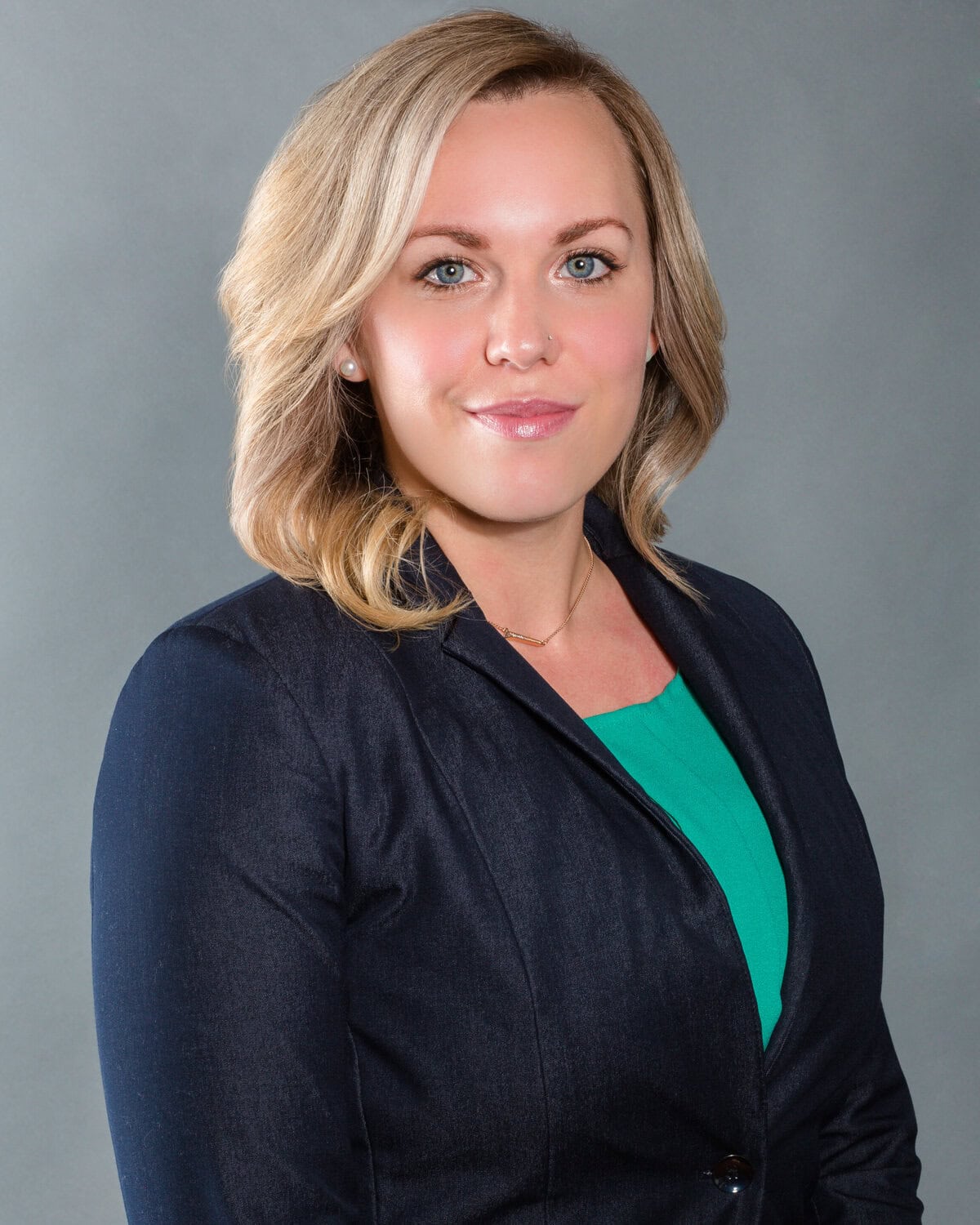 Professional Woman Portrait for WJR Studios Confident woman in professional attire for WJR Studios website.
